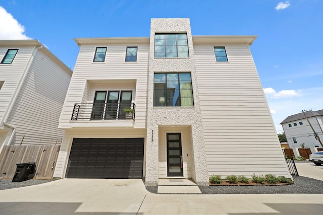 828 Wakefield Dr Unit B, Houston, TX 77018 - contemporary home with a balcony, an attached garage, and driveway
