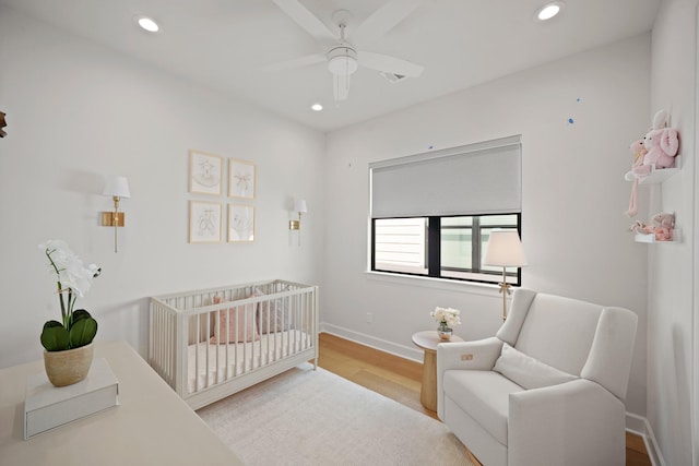 828 Wakefield Dr Unit B, Houston, TX 77018 - bedroom with a nursery area, recessed lighting, wood finished floors, baseboards, and ceiling fan