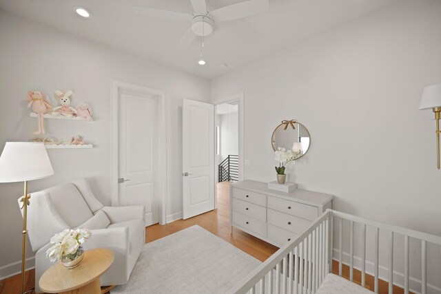 828 Wakefield Dr Unit B, Houston, TX 77018 - bedroom featuring a nursery area, light wood finished floors, recessed lighting, and ceiling fan