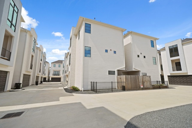 828 Wakefield Dr Unit B, Houston, TX 77018 - rear view of house with a residential view and driveway