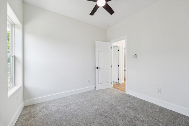 3708 Avenue S, Santa Fe, TX 77510 - empty room with light colored carpet, ceiling fan, and baseboards
