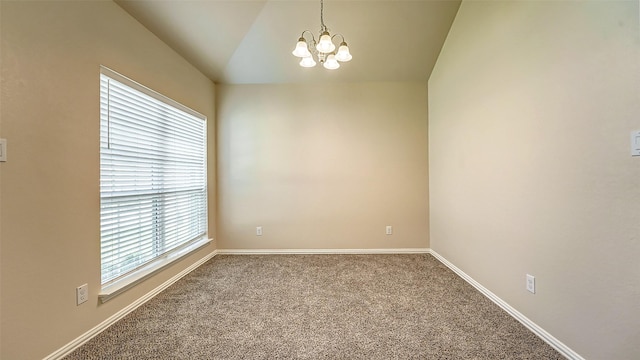 32706 Oak Heights Ln, Brookshire, TX 77423 - spare room with a chandelier, carpet floors, baseboards, and vaulted ceiling
