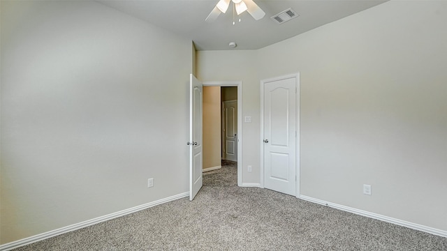 32706 Oak Heights Ln, Brookshire, TX 77423 - unfurnished bedroom featuring light carpet, baseboards, and a ceiling fan