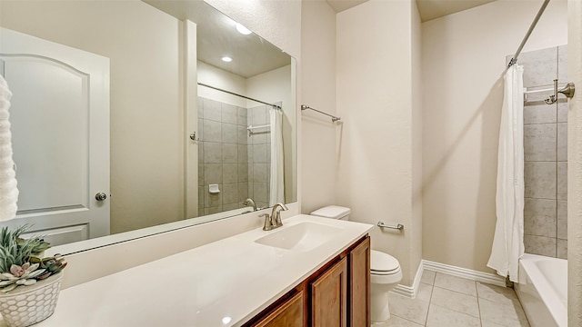 32706 Oak Heights Ln, Brookshire, TX 77423 - bathroom featuring toilet, vanity, tile patterned floors, baseboards, and shower / bathtub combination with curtain