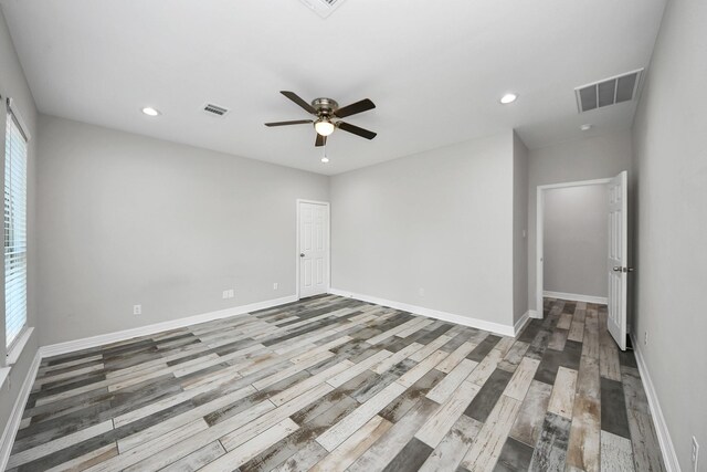 25450 Killarney St, Hempstead, TX 77445 - unfurnished room featuring wood finished floors, baseboards, recessed lighting, and ceiling fan