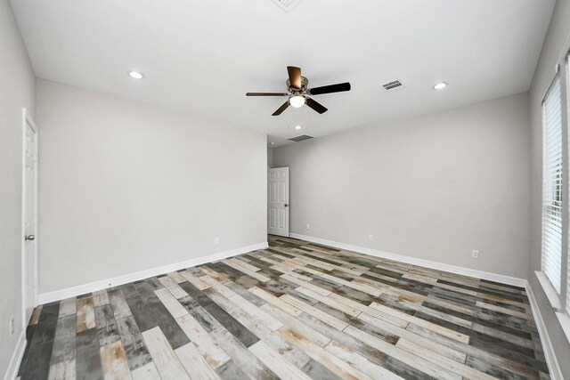 25450 Killarney St, Hempstead, TX 77445 - spare room with ceiling fan, wood finished floors, recessed lighting, and baseboards