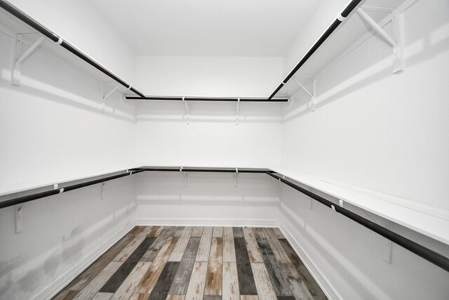 25450 Killarney St, Hempstead, TX 77445 - spacious closet featuring wood finished floors