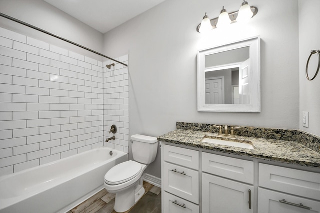 25450 Killarney St, Hempstead, TX 77445 - bathroom with vanity, toilet, wood finished floors, shower / washtub combination, and baseboards