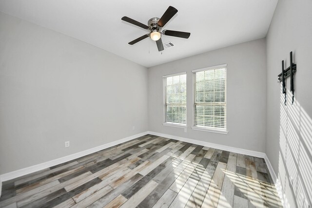 25450 Killarney St, Hempstead, TX 77445 - empty room with wood finished floors, baseboards, and a ceiling fan