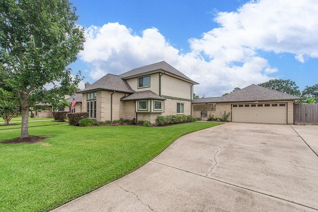 6310 Gleneagles Dr, Pasadena, TX 77505 - view of front of home featuring concrete driveway, brick siding, and a garage