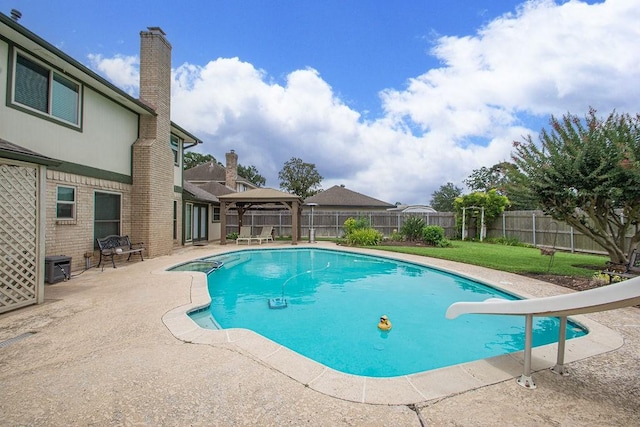 6310 Gleneagles Dr, Pasadena, TX 77505 - view of pool with a water slide, a gazebo, a patio, and a fenced backyard
