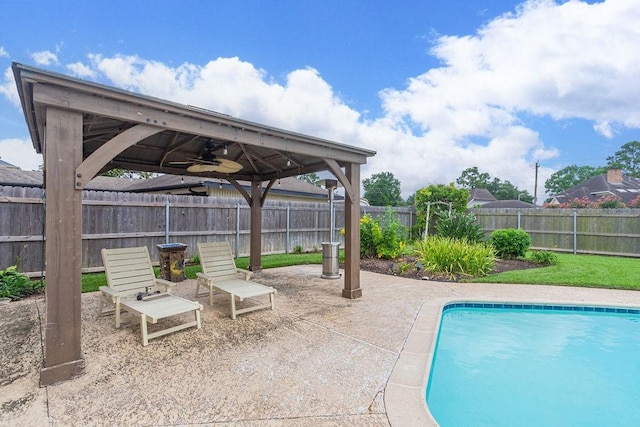 6310 Gleneagles Dr, Pasadena, TX 77505 - view of swimming pool featuring a gazebo, ceiling fan, a fenced backyard, and a patio area