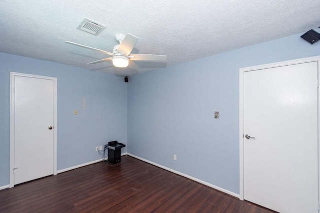 6310 Gleneagles Dr, Pasadena, TX 77505 - empty room with wood finished floors, ceiling fan, and a textured ceiling