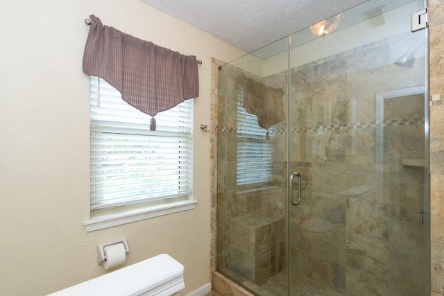 6310 Gleneagles Dr, Pasadena, TX 77505 - bathroom with a shower stall and a textured ceiling