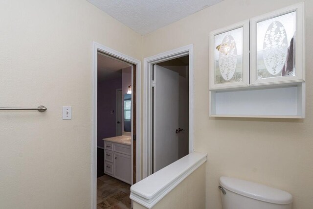 6310 Gleneagles Dr, Pasadena, TX 77505 - bathroom with vanity and toilet