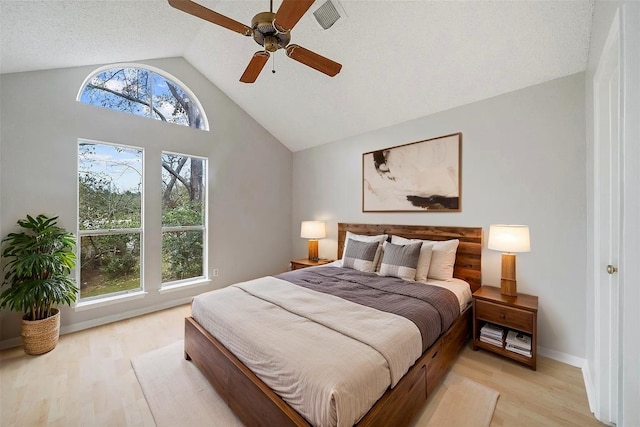 3317 Golden Trails Dr Unit 802, Houston, TX 77345 - bedroom featuring light wood-type flooring, ceiling fan, baseboards, and high vaulted ceiling