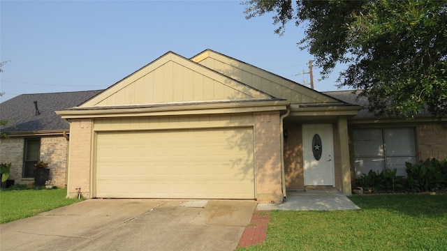 2223 Sentinal Oaks St, Sugar Land, TX 77478 - ranch-style home with brick siding, a garage, driveway, a front yard, and roof with shingles