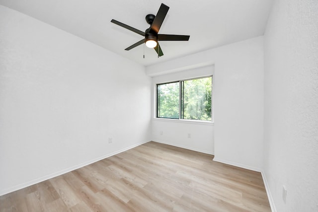 3223 Deer Valley Dr, Spring, TX 77373 - spare room with light wood-style flooring, baseboards, and a ceiling fan