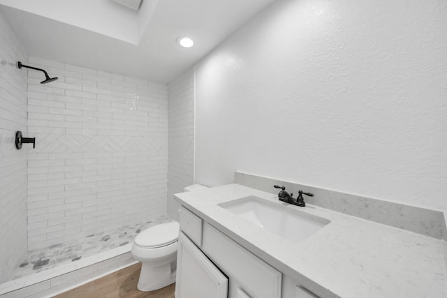 3223 Deer Valley Dr, Spring, TX 77373 - full bath featuring vanity, a shower stall, toilet, wood finished floors, and recessed lighting