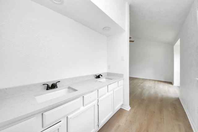 3223 Deer Valley Dr, Spring, TX 77373 - bathroom featuring wood finished floors and double vanity