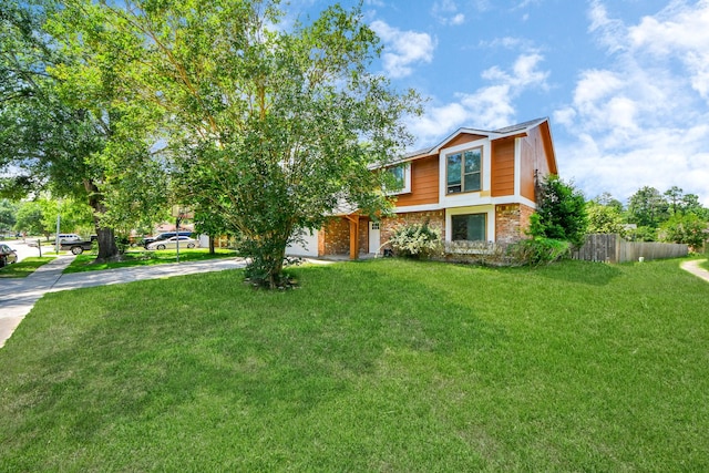 3223 Deer Valley Dr, Spring, TX 77373 - view of front of house featuring driveway and brick siding