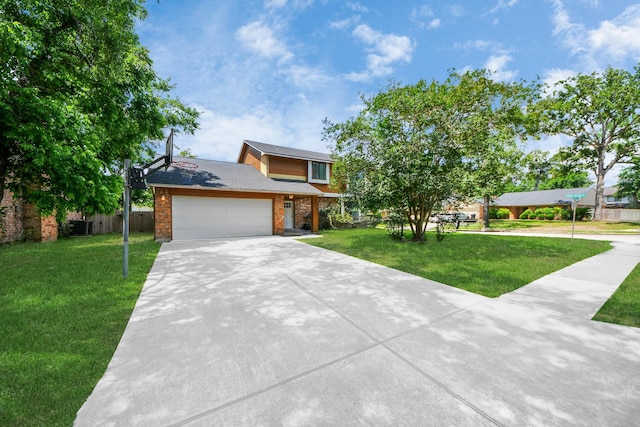 3223 Deer Valley Dr, Spring, TX 77373 - view of front of property featuring brick siding, an attached garage, and concrete driveway
