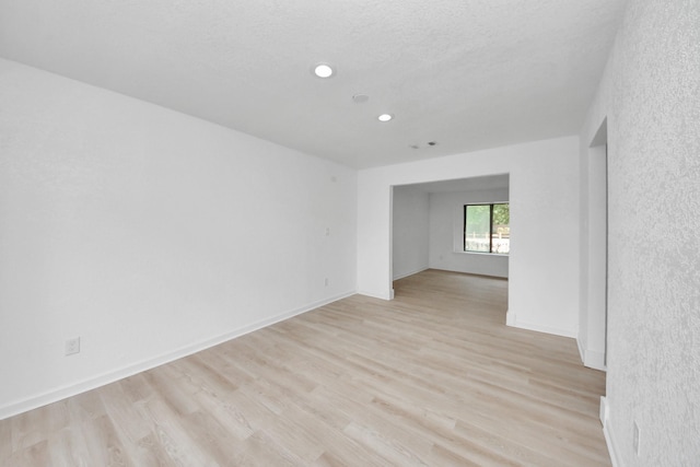 3223 Deer Valley Dr, Spring, TX 77373 - empty room featuring recessed lighting, light wood-style flooring, and baseboards