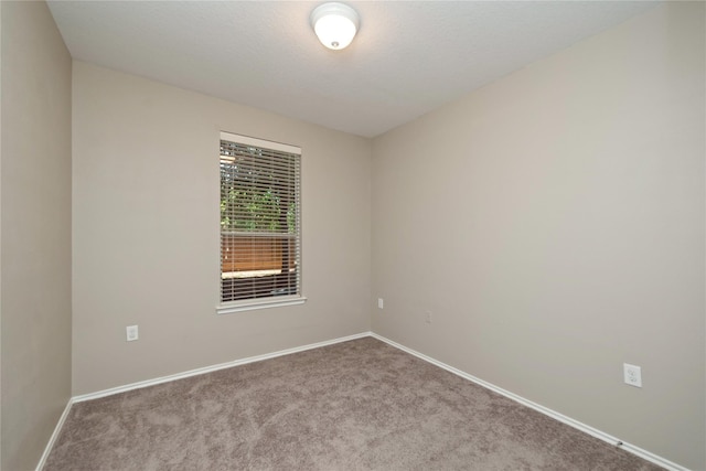 13600 Breton Ridge St Unit 24A, Houston, TX 77070 - carpeted spare room with baseboards
