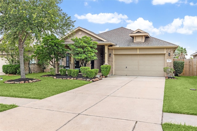 2304 Cantabria Ln, League City, TX 77573 - view of front of house with brick siding, driveway, a garage, and a shingled roof