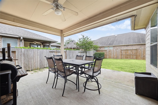 2304 Cantabria Ln, League City, TX 77573 - view of patio / terrace with a ceiling fan and outdoor dining area