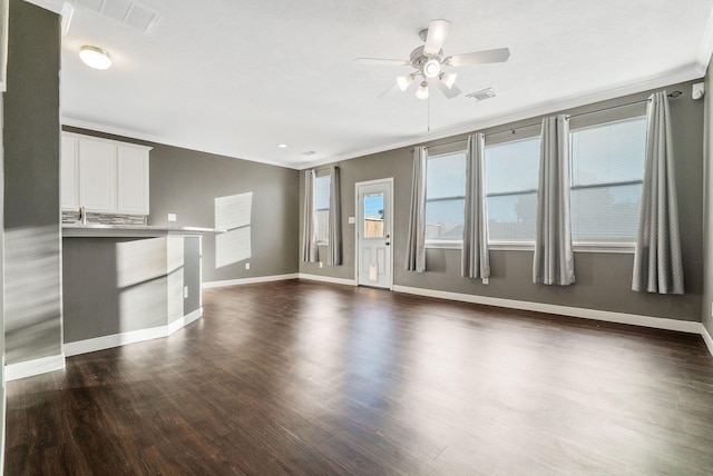 17139 Oakwood Chase Dr, Spring, TX 77379 - unfurnished living room with a ceiling fan, dark wood-style flooring, ornamental molding, and baseboards
