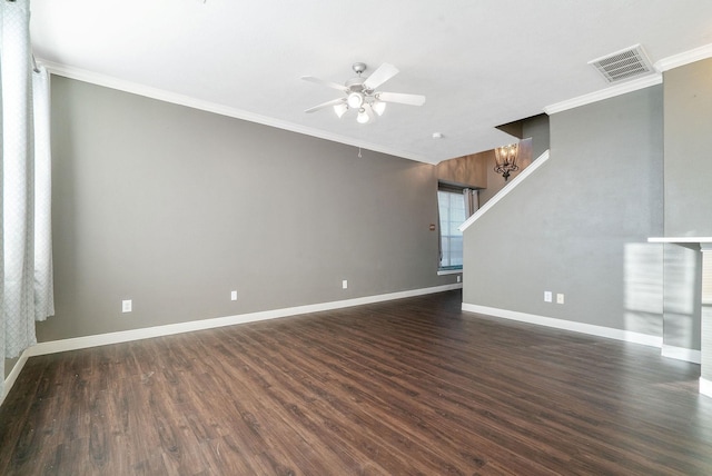 17139 Oakwood Chase Dr, Spring, TX 77379 - unfurnished living room with ceiling fan, dark wood-style floors, ornamental molding, baseboards, and a chandelier
