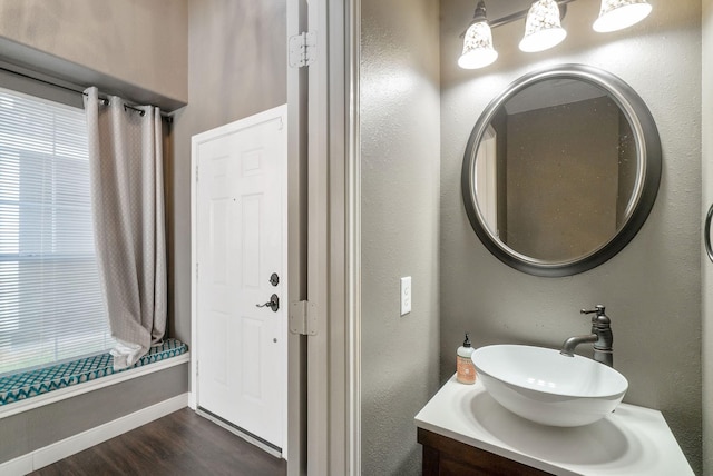 17139 Oakwood Chase Dr, Spring, TX 77379 - bathroom featuring wood finished floors, vanity, and baseboards