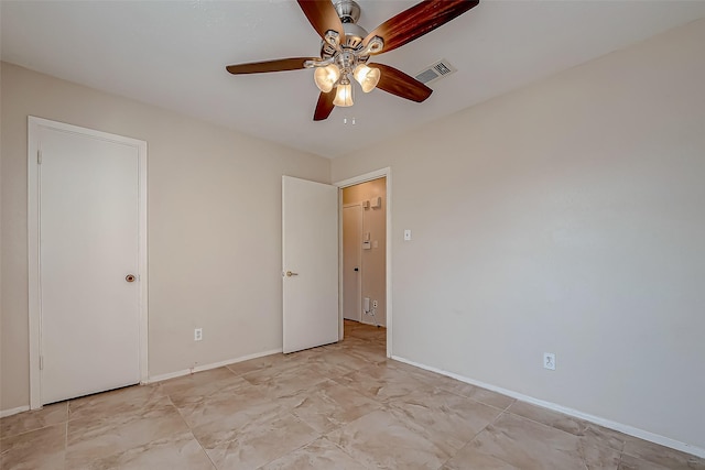 7650 Smiling Wood Ln, Houston, TX 77086 - unfurnished bedroom with baseboards and a ceiling fan