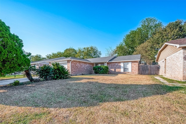 7650 Smiling Wood Ln, Houston, TX 77086 - ranch-style home with brick siding