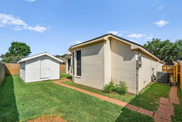 1803 Mustang Xing, Missouri City, TX 77459 - rear view of property with central AC and brick siding