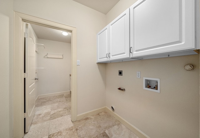 1803 Mustang Xing, Missouri City, TX 77459 - laundry area featuring cabinet space, electric dryer hookup, hookup for a washing machine, baseboards, and gas dryer hookup