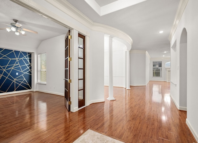 1803 Mustang Xing, Missouri City, TX 77459 - empty room featuring wood finished floors, a ceiling fan, ornate columns, baseboards, and recessed lighting