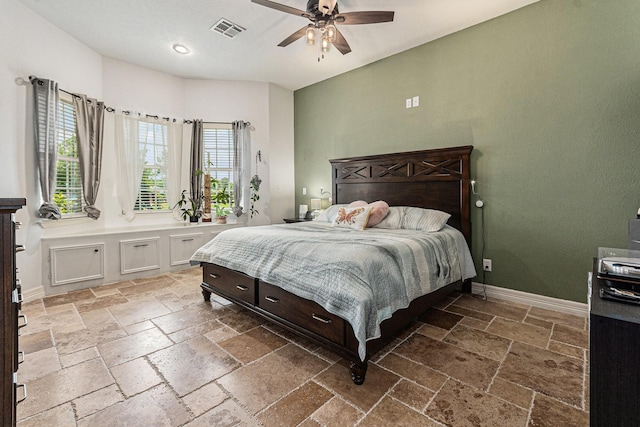 1827 E Cedar Bayou Lynchburg Rd, Baytown, TX 77521 - bedroom featuring stone tile flooring, recessed lighting, ceiling fan, and baseboards
