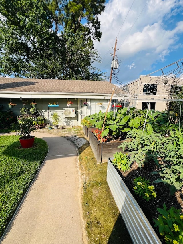 6639 Seaton Valley Dr, Spring, TX 77379 - surrounding community with a vegetable garden