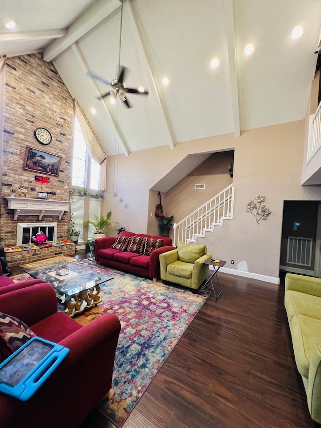 6639 Seaton Valley Dr, Spring, TX 77379 - living area featuring high vaulted ceiling, baseboards, ceiling fan, stairs, and wood finished floors