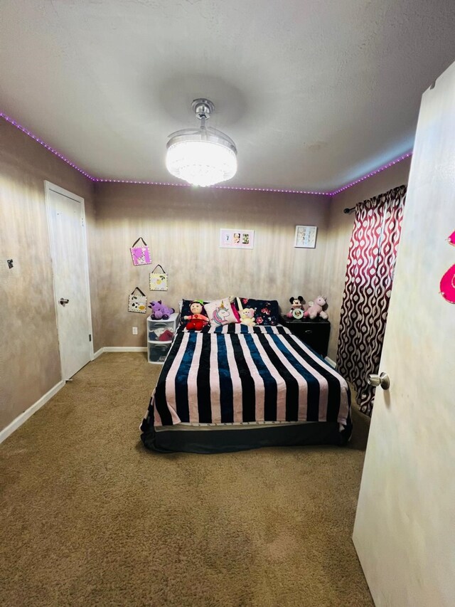 6639 Seaton Valley Dr, Spring, TX 77379 - bedroom featuring carpet floors and baseboards