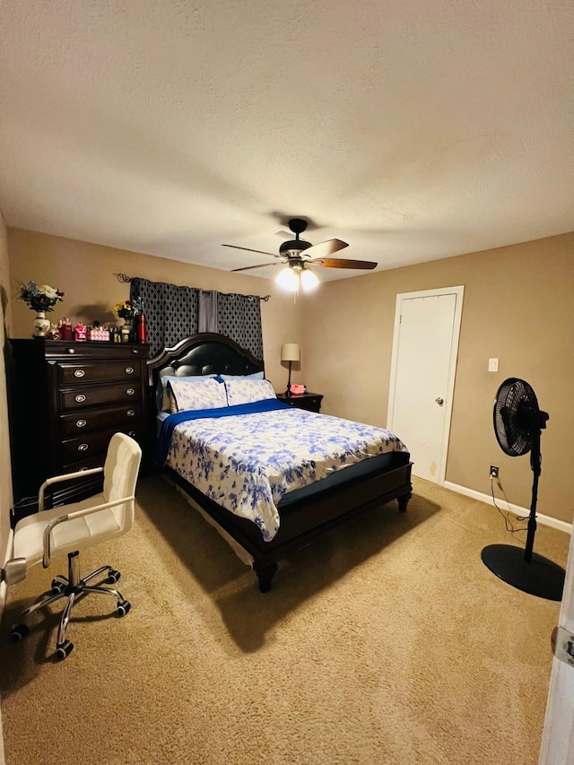6639 Seaton Valley Dr, Spring, TX 77379 - carpeted bedroom with ceiling fan and baseboards