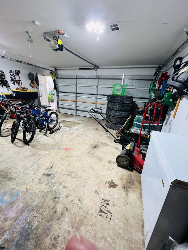 6639 Seaton Valley Dr, Spring, TX 77379 - garage featuring a garage door opener