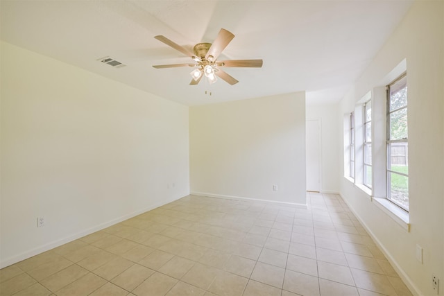 11807 Sagecliff Dr, Houston, TX 77089 - empty room with ceiling fan, light tile patterned flooring, and baseboards