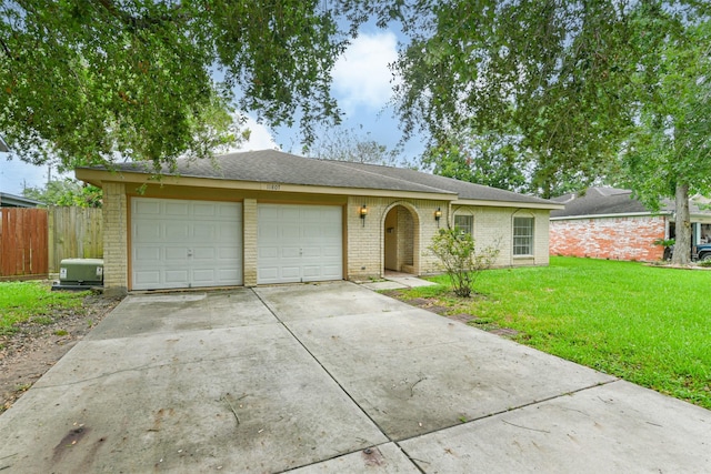 11807 Sagecliff Dr, Houston, TX 77089 - view of front facade with brick siding, driveway, a garage, and a shingled roof
