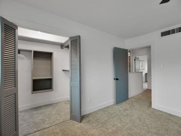 3809 N Braeswood Unit 14, Houston, TX 77025 - unfurnished bedroom with carpet floors, baseboards, and a closet
