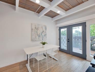 3809 N Braeswood Unit 14, Houston, TX 77025 - dining area with french doors, wood ceiling with exposed beams, and wood finished floors