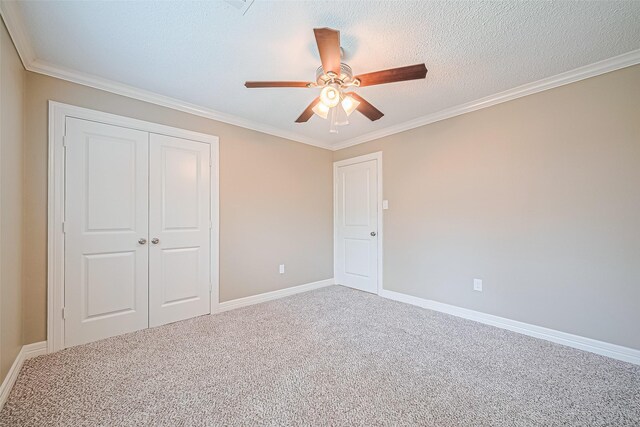3705 Autumn Ln, Baytown, TX 77521 - unfurnished bedroom with carpet flooring, a closet, baseboards, ornamental molding, and ceiling fan
