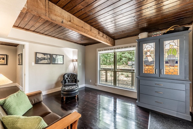 44 Post Oak Dr, Huntsville, TX 77320 - sitting room featuring wooden ceiling with exposed beams, baseboards, and dark wood-type flooring